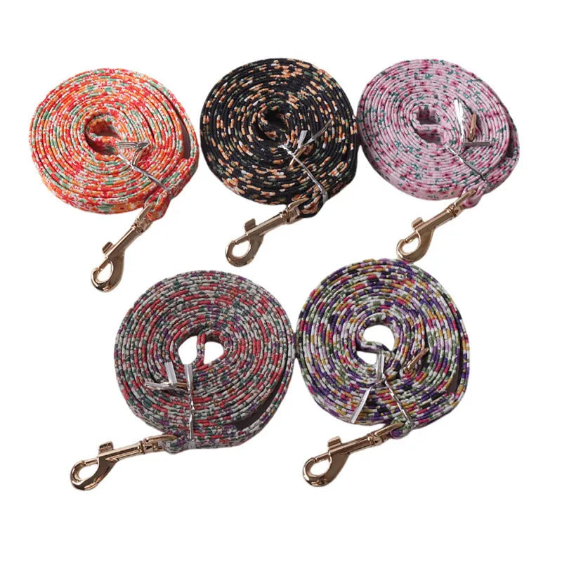Floral pattern pet harness suit with matching leash in cloth material showing size options