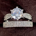 White gold-coloured geometric wedding ring bracelet with round elements on size display