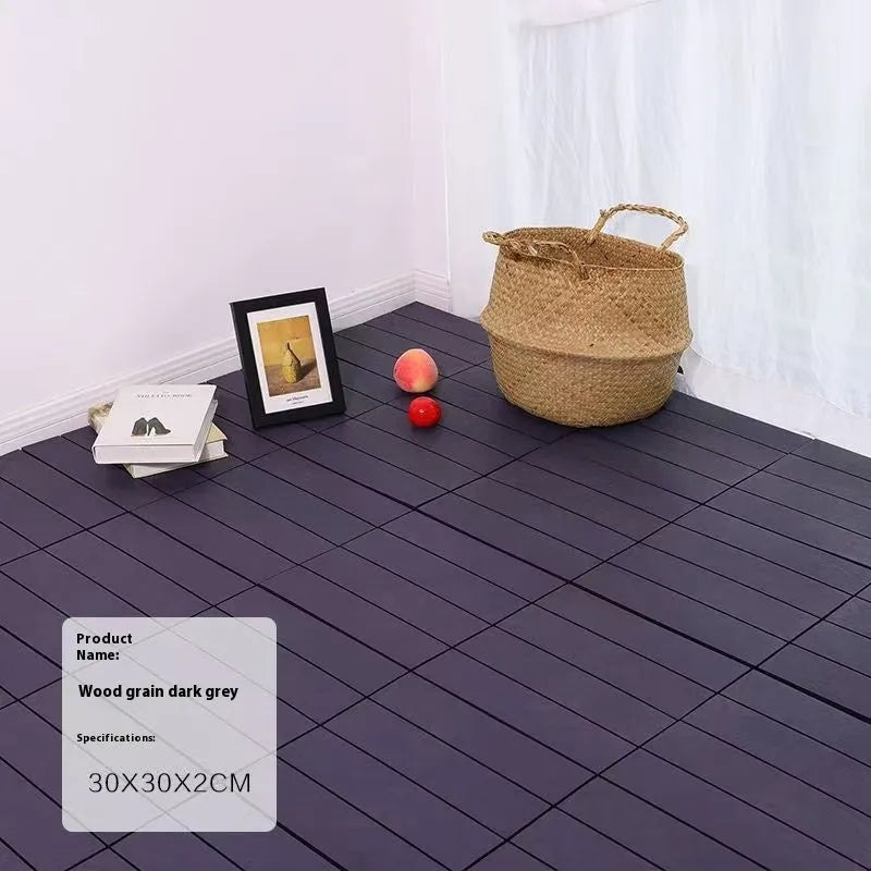 Pack of ten wood grain plastic floor tiles showing splicing edges and non-slip texture