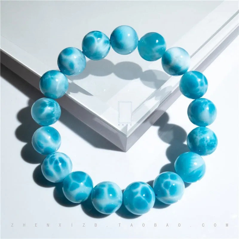 Blue bodhi bracelet with natural sea-pattern crystals and pearl accents in Maillard style