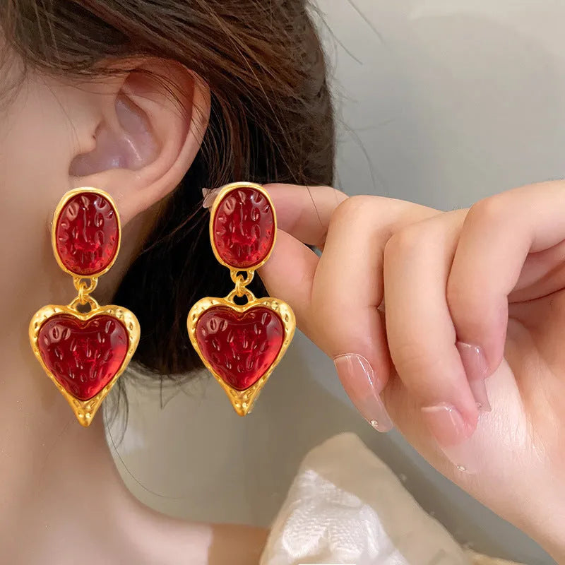 Silver needle pleated oval love heart stud earrings in alloy, showing green, purple, red, and yellow and white colour options.