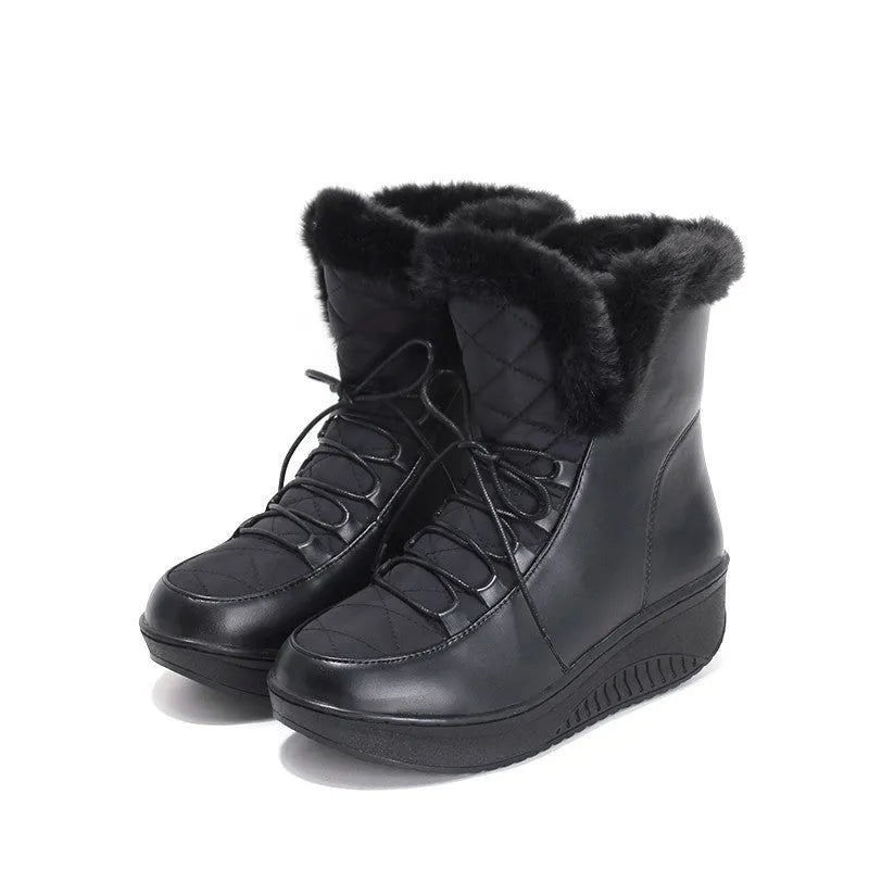 Women's black platform winter boots with lace-up closure and plush lining.