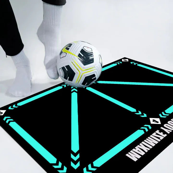 Black rectangular football training mat with non-slip surface measuring 60cm by 90cm