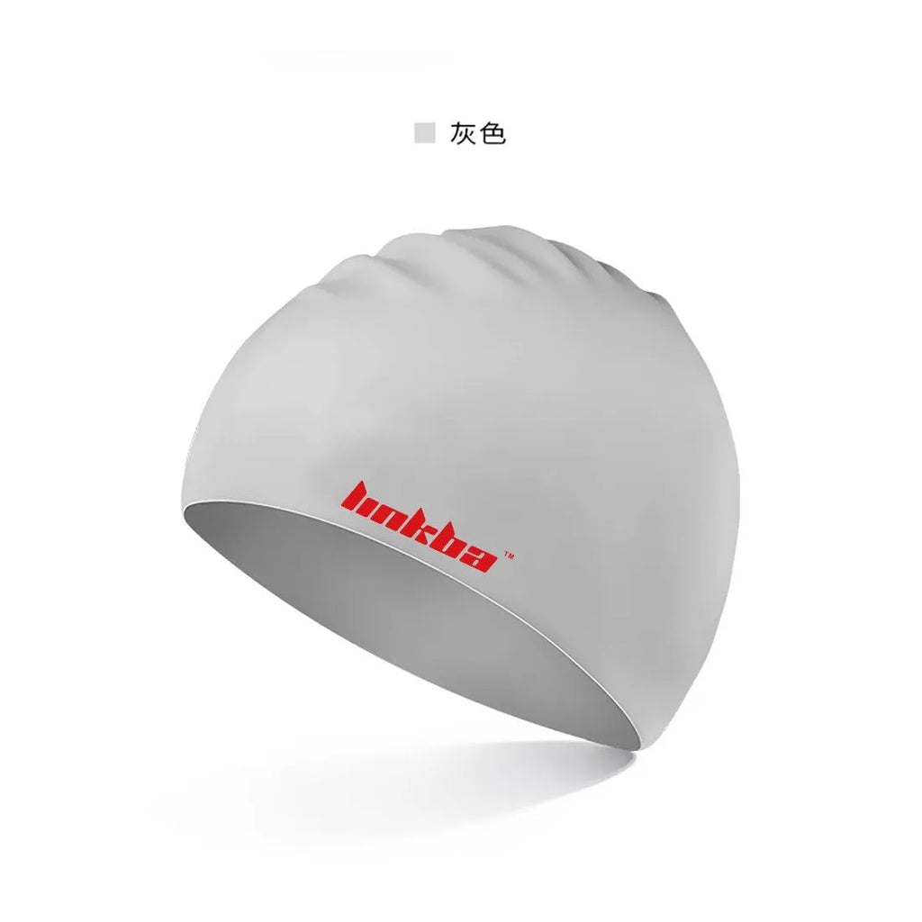 Silicone swimming cap with a graphic letter pattern, shown in one of five colours: black, white, yellow, blue, or grey.