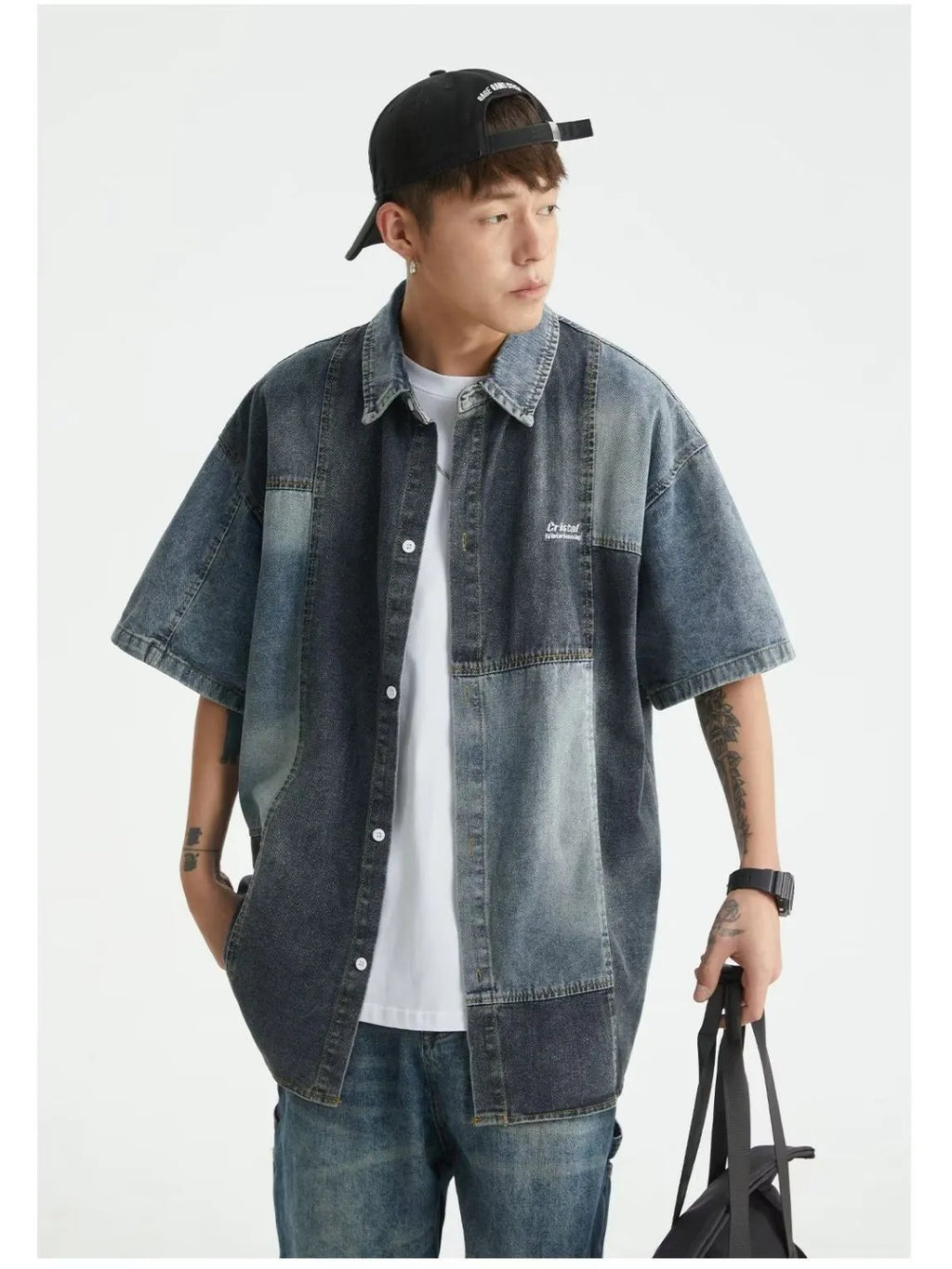 Blue Japanese-style loose-fit denim shirt for men with washed stitching detail.