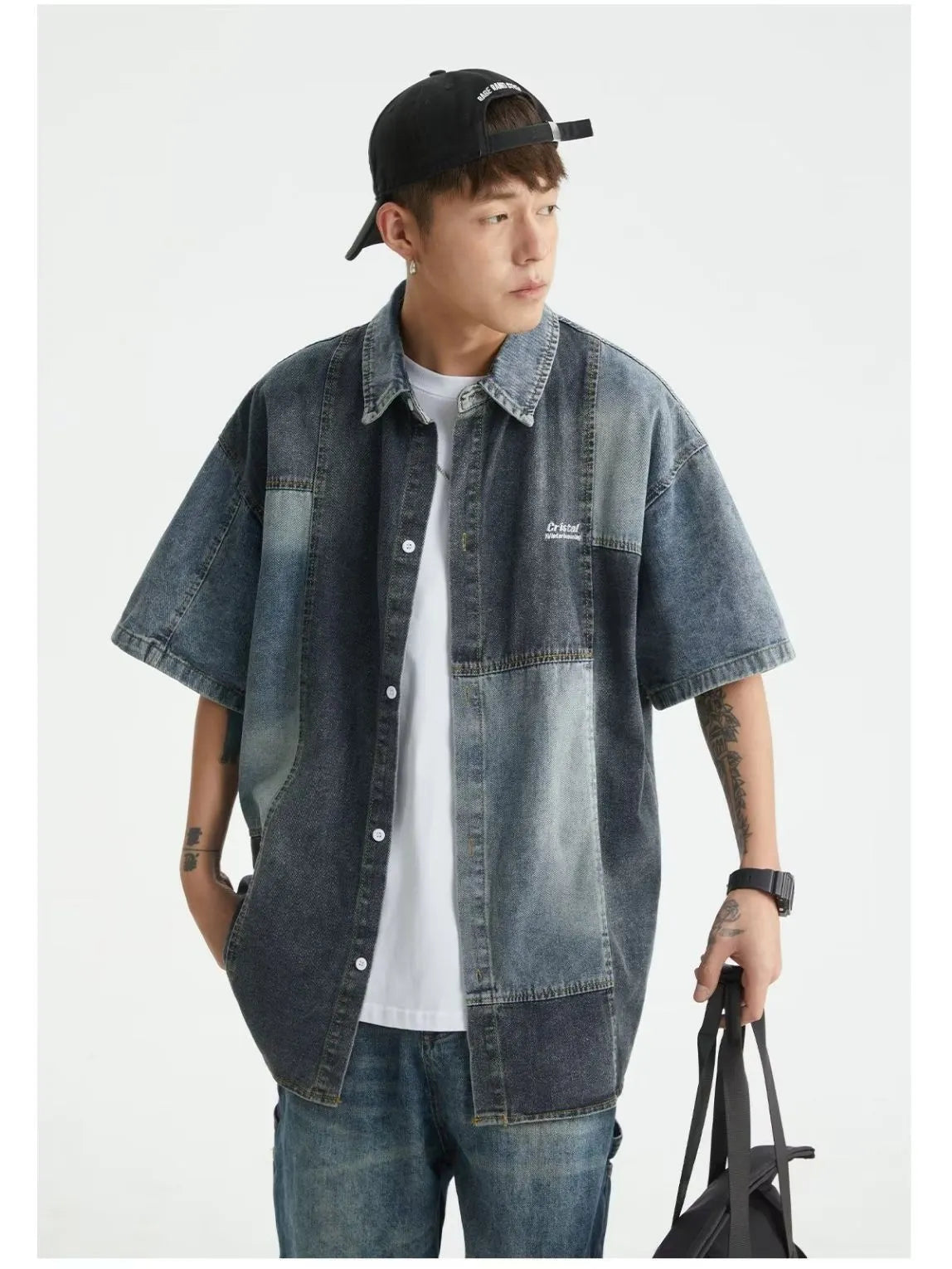 Blue Japanese-style loose-fit denim shirt for men with washed stitching detail.