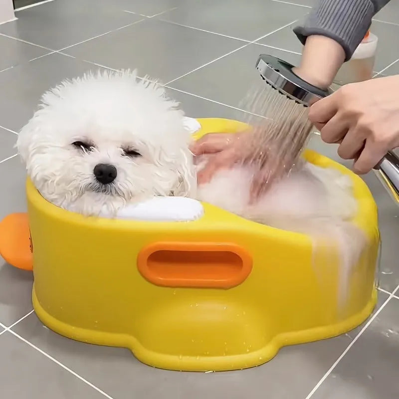 Blue PVC duck-shaped pet bathtub for dogs and cats on a white background.