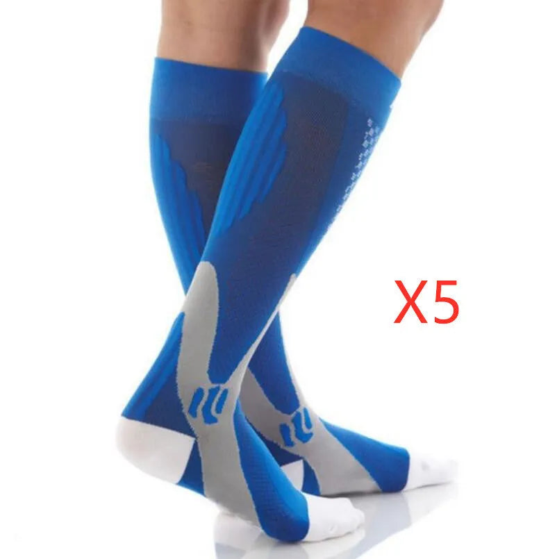 Black graduated compression socks with athletic fit for men and women, shown laid flat.