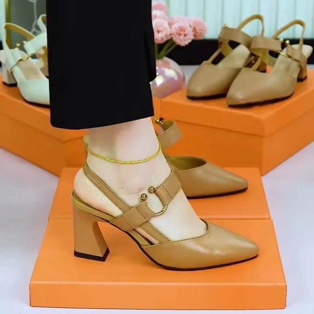 Womans closed toe leather sandal with a chunky high heel, shown in an apricot colour.