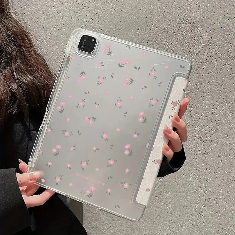 Clear tri-fold iPad case with floral design, shown in stand mode.