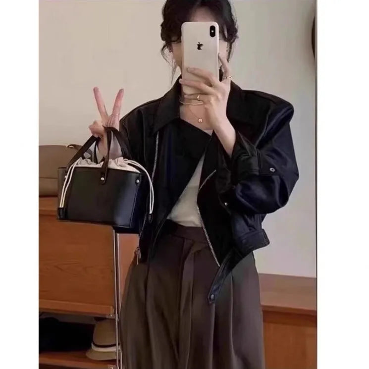 Women's slim fit retro leather coat jacket in imitation leather polyester available in black or brown colours