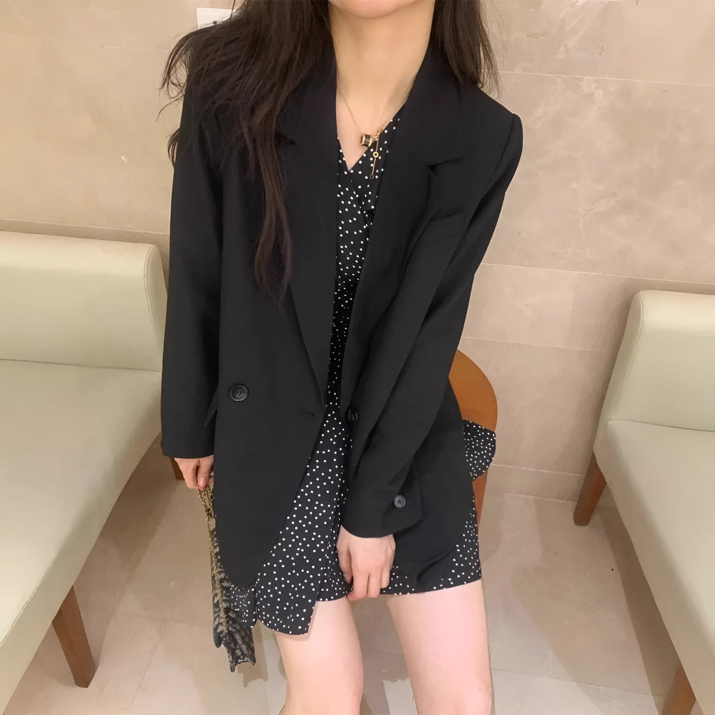 Women's black polka dot high waist midi dress with long sleeves in pullover style polyester fabric
