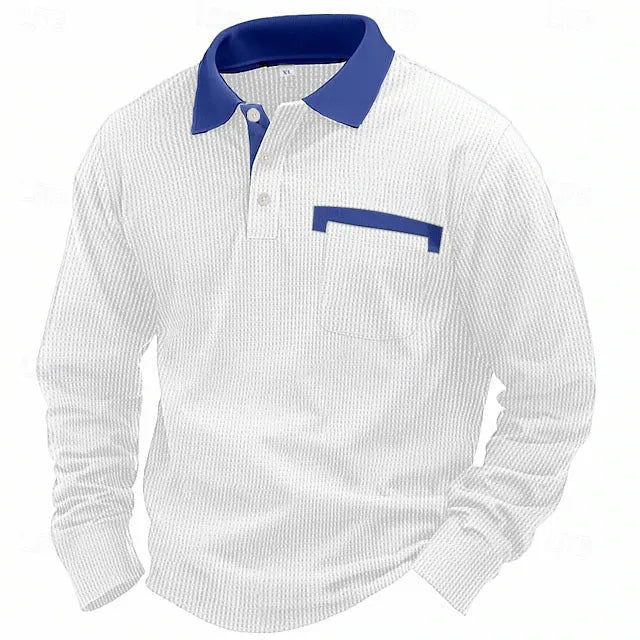 Man modelling a loose-fit long-sleeved waffle-knit polo shirt in a solid colour with an asymmetrical style detail.