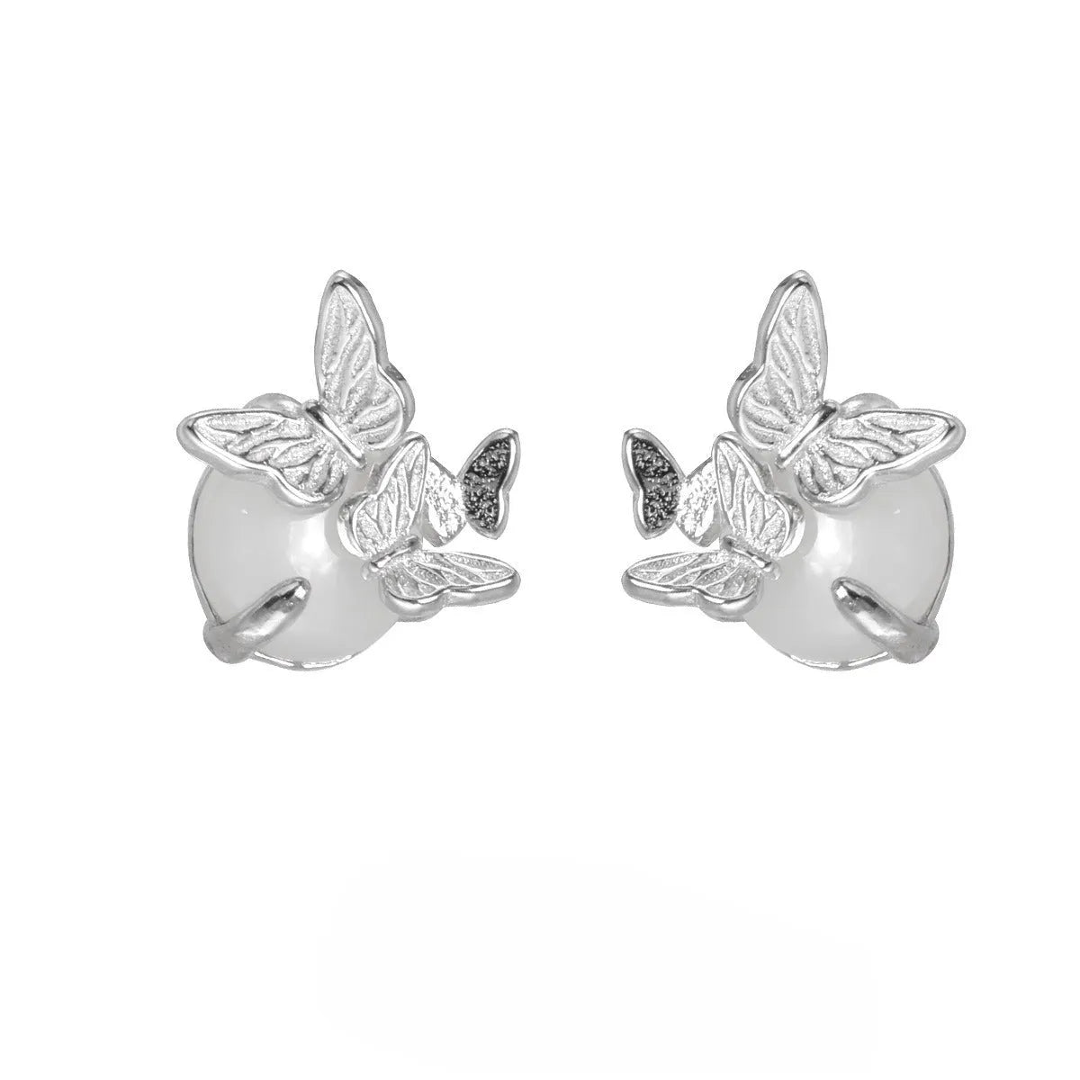 A pair of 925 silver stud earrings with an original butterfly and animal design in a gold colour finish.
