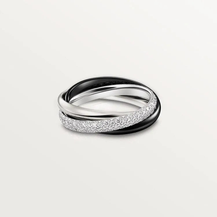 A pair of silver couple rings with full diamond settings, showing U-shaped and geometric band designs on a size 8 finger.