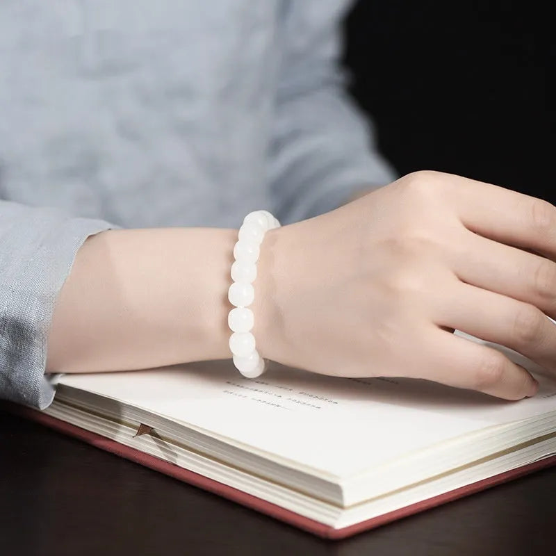 White Hetian jade barrel beads bracelet showing three size options for men and women