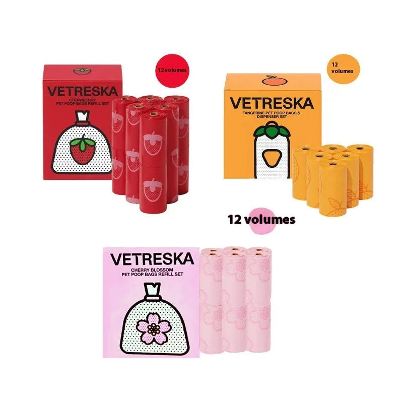 Refillable plastic dog poo bag dispenser capsule with a roll of scented biodegradable bags in strawberry design.