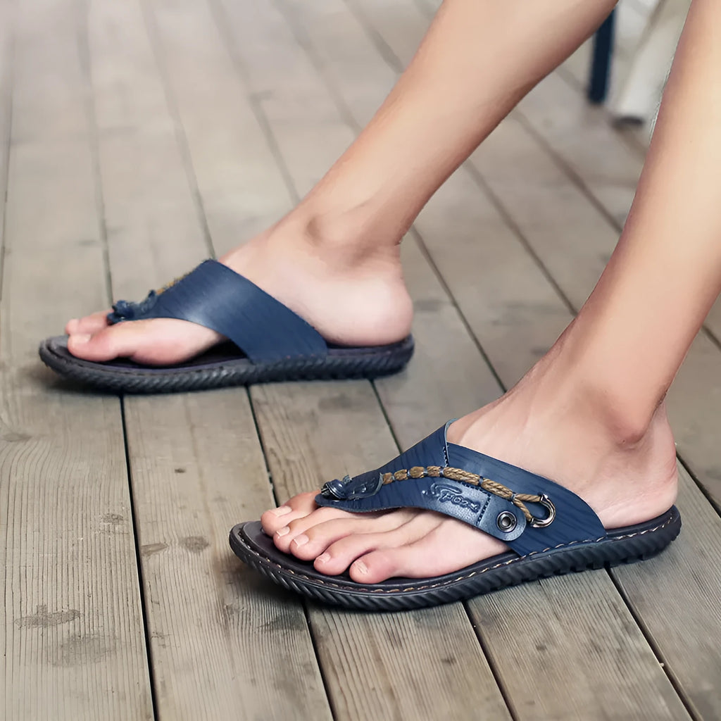 Men's black casual PU leather slippers with a non-slip sole, shown on a plain background.