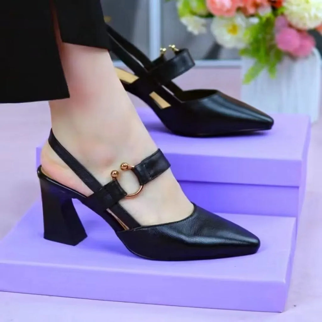 Womans closed toe leather sandal with a chunky high heel, shown in an apricot colour.