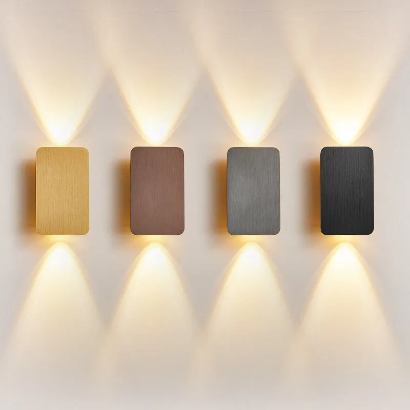 Minimalist Nordic-style LED wall lamp in black finish, mounted on a wall, showing clean lines and modern design.
