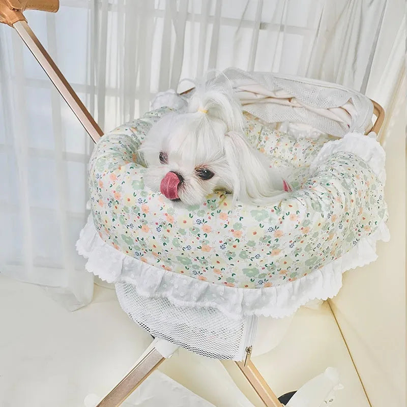 Pet stroller accessory set showing cotton anti-dirty towel, cushion, and pillow in a floral pattern.