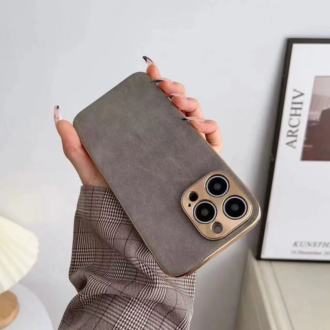 Leather texture TPU phone case for iPhone in solid black, blue, grey, and grey-green colours.