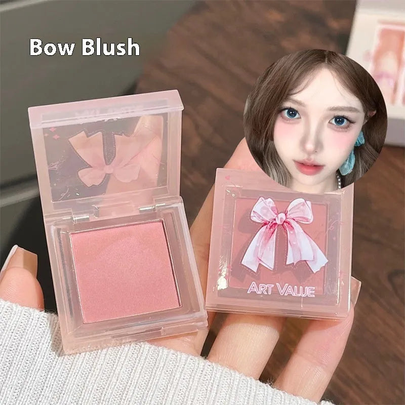 Butterfly Box makeup set with four lip muds, powder blusher, and butterfly necklace