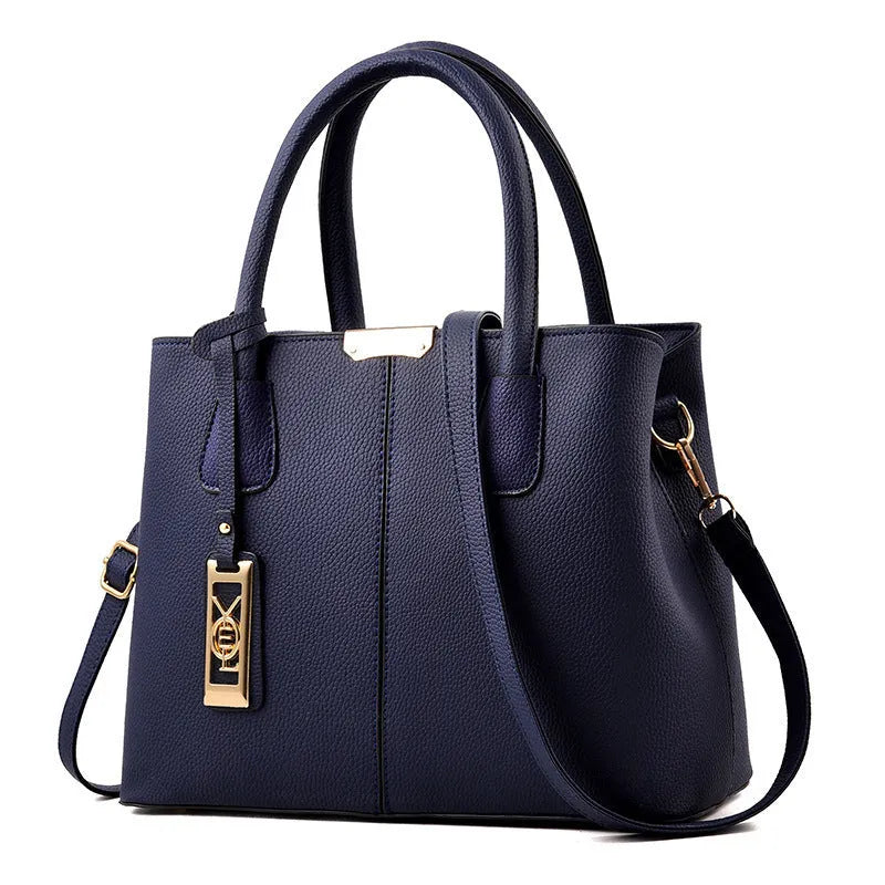 Soft PU women's shoulder bag in horizontal square shape with leather strap, available in multiple colours