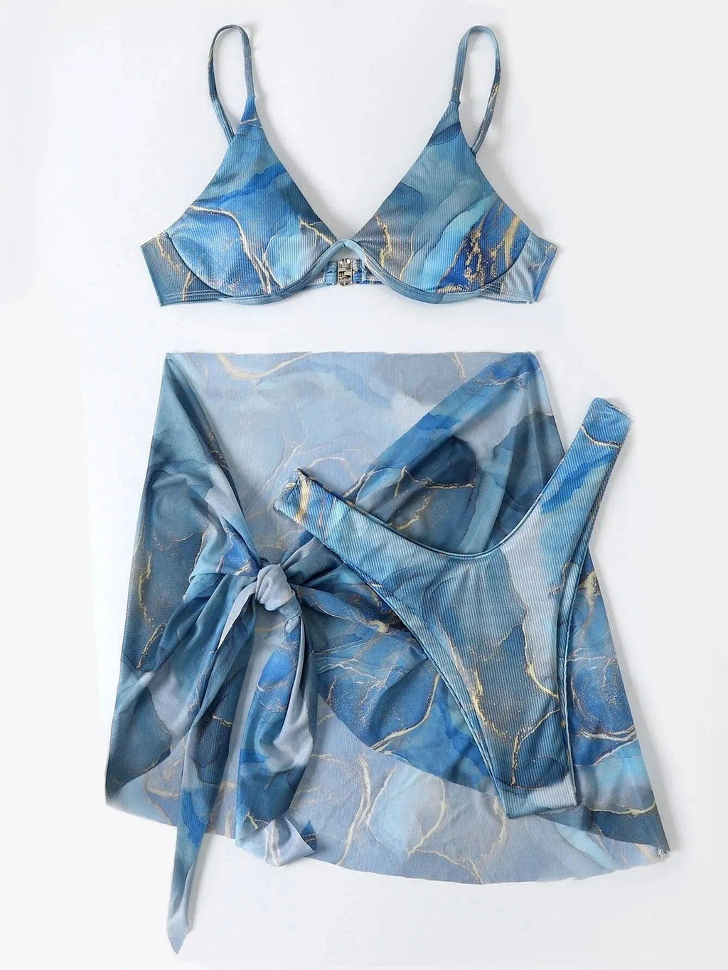 Women's marble print bikini set with triangle bra, briefs, and matching skirt in blue.