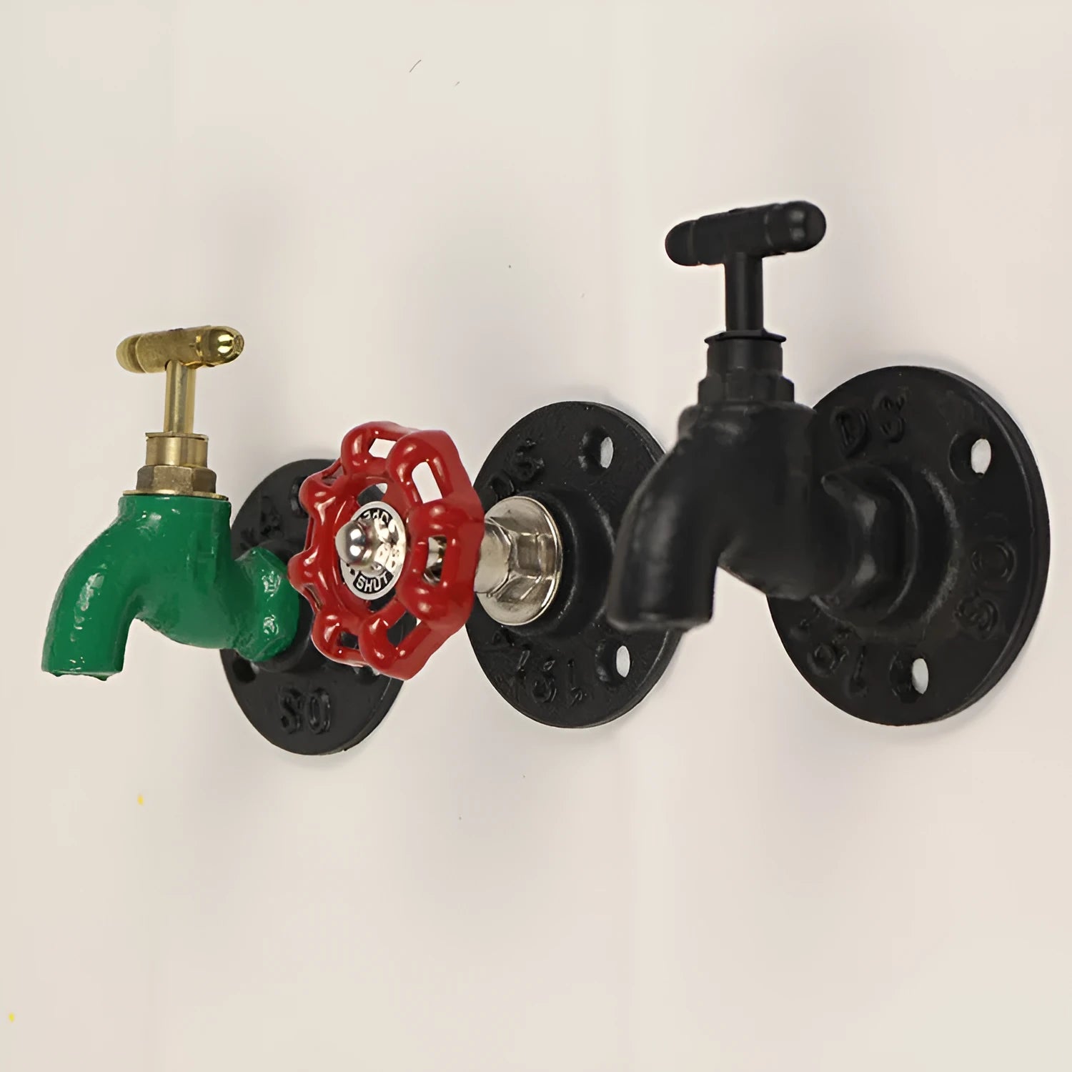 Metal wall-mounted towel rack hook designed like a water pipe, in a polished finish.
