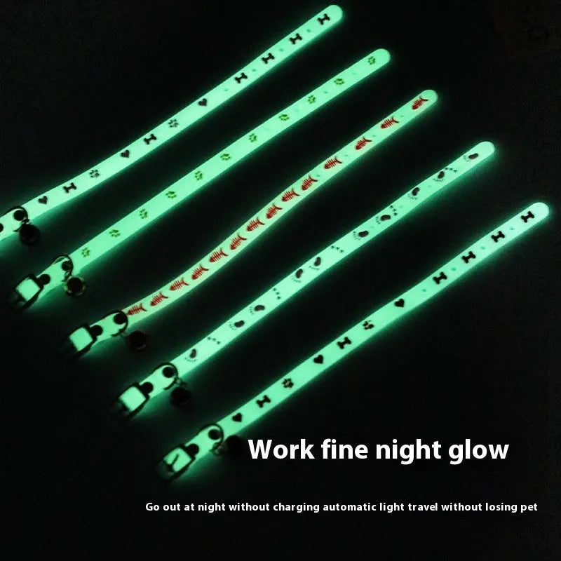 Luminous cat collar with adjustable silicone strap and metal bell in paw print pattern