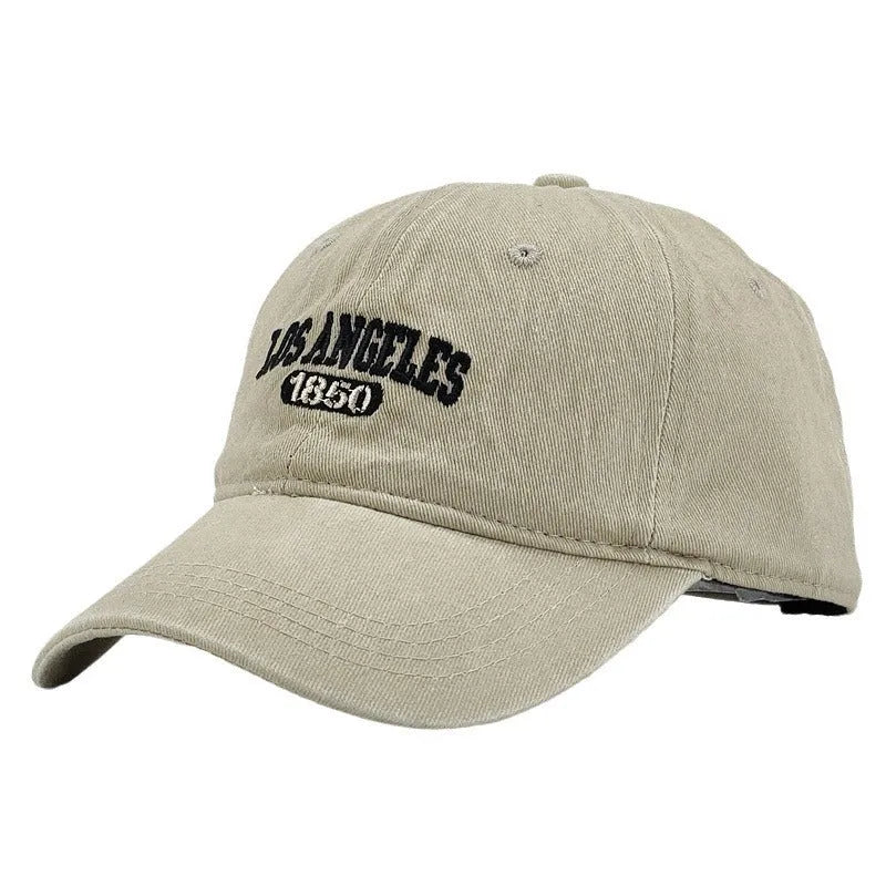 Retro personalised embroidered peaked cap in acrylic fabric with adjustable fit and distressed lettering