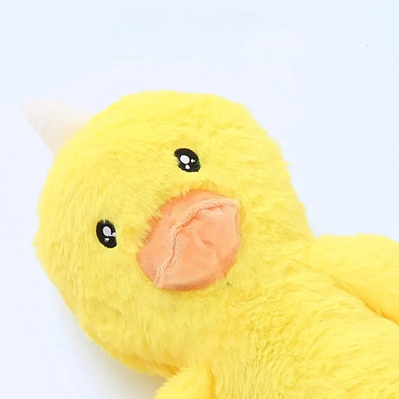 Large pink and yellow plush dog toy with rattle and paper sound elements for golden retrievers