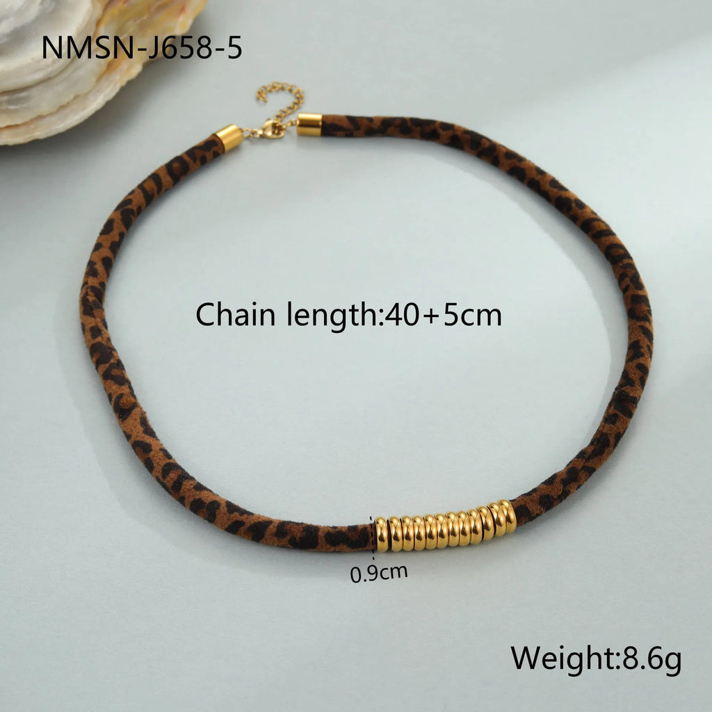 Geometric leopard pendant necklace with gold electroplated finish on adjustable stainless steel chain