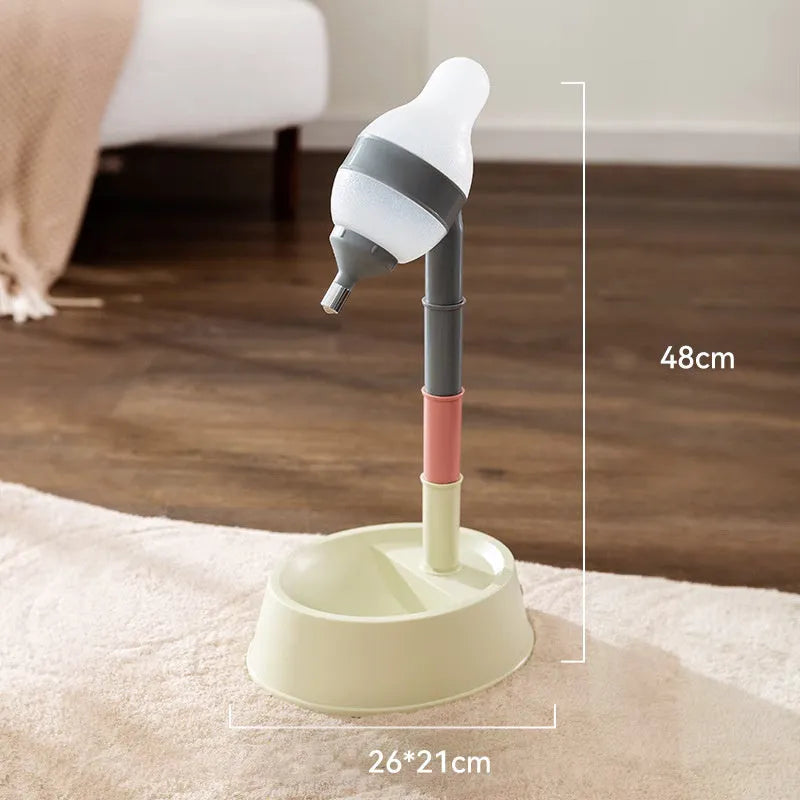 Green height-adjustable pet water dispenser with detachable pole and weighted bowl on a floor.