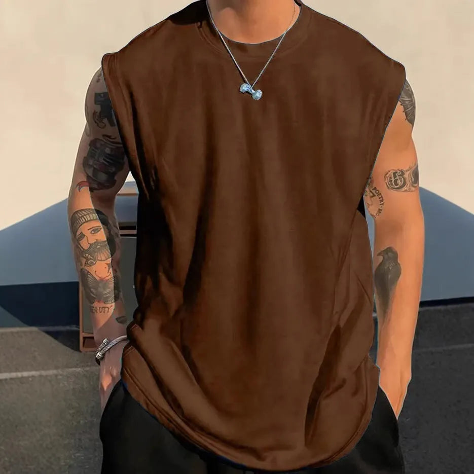 Men's solid colour loose fit cotton tank top on a hanger, showing straight hem and sleeveless design.
