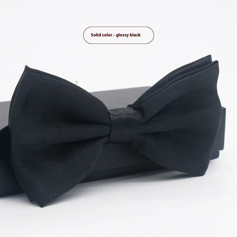 Men's flat head solid colour bow tie in polyester, showing 12cm by 6cm size on a background.