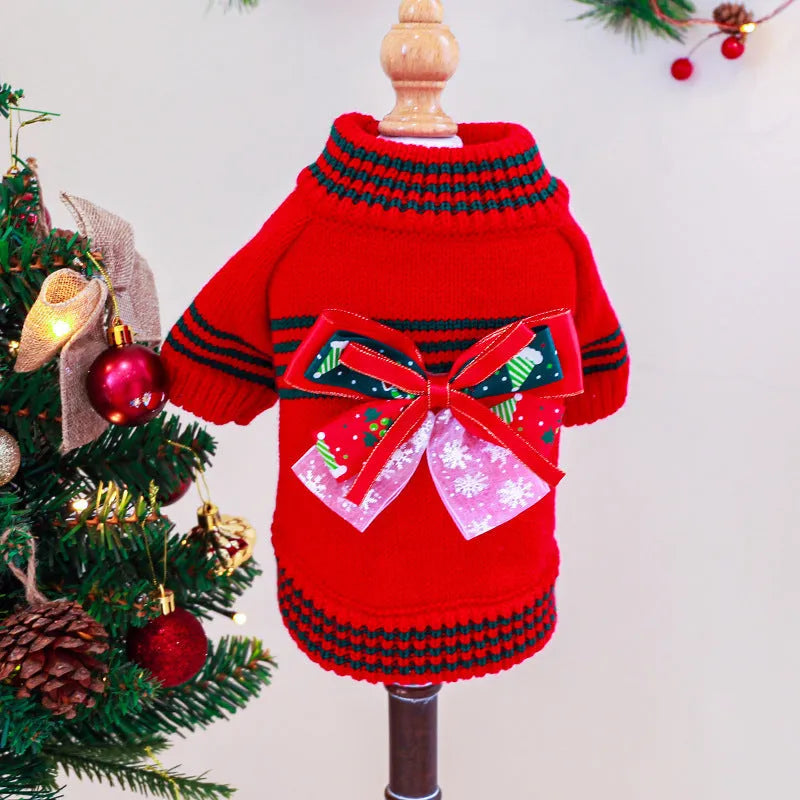 Green Christmas pet sweater for a small dog on a festive background.