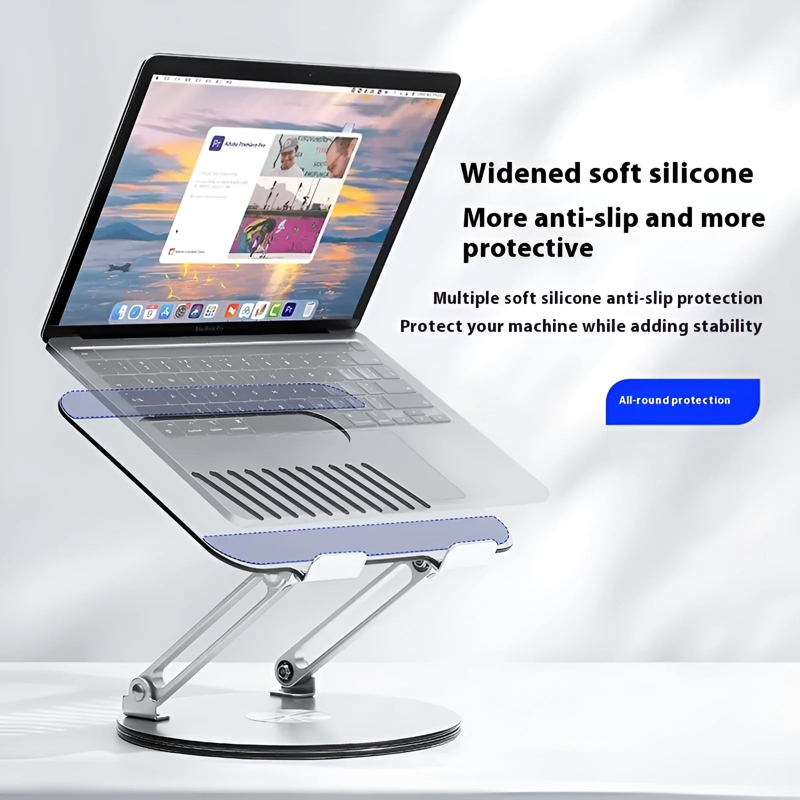Silver aluminium laptop stand with height adjustment mechanism in folded position