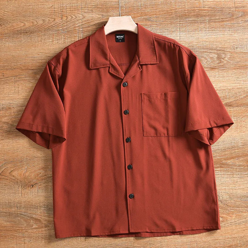 Men's loose fit short sleeve shirt in polyester cotton fabric, shown in army green colour