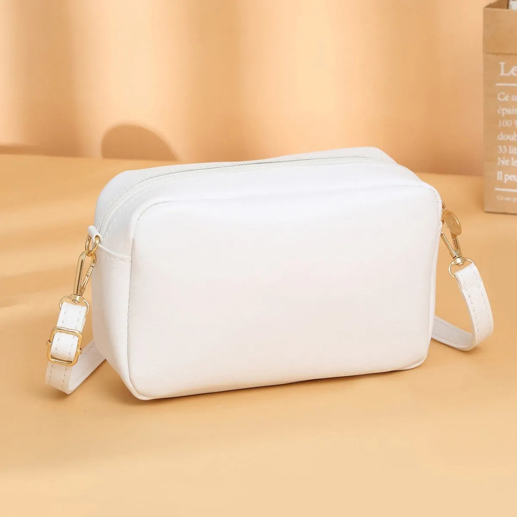 Women's shoulder bag in PU leather with three-dimensional pockets, horizontal square shape