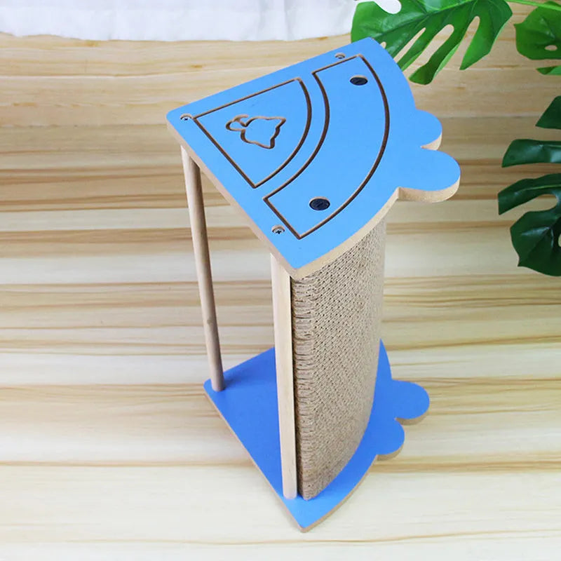Grey cardboard corner cat scratcher with hanging ball mounted in a room corner.