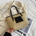 Straw woven women's shoulder bag in retro style with three-dimensional pocket
