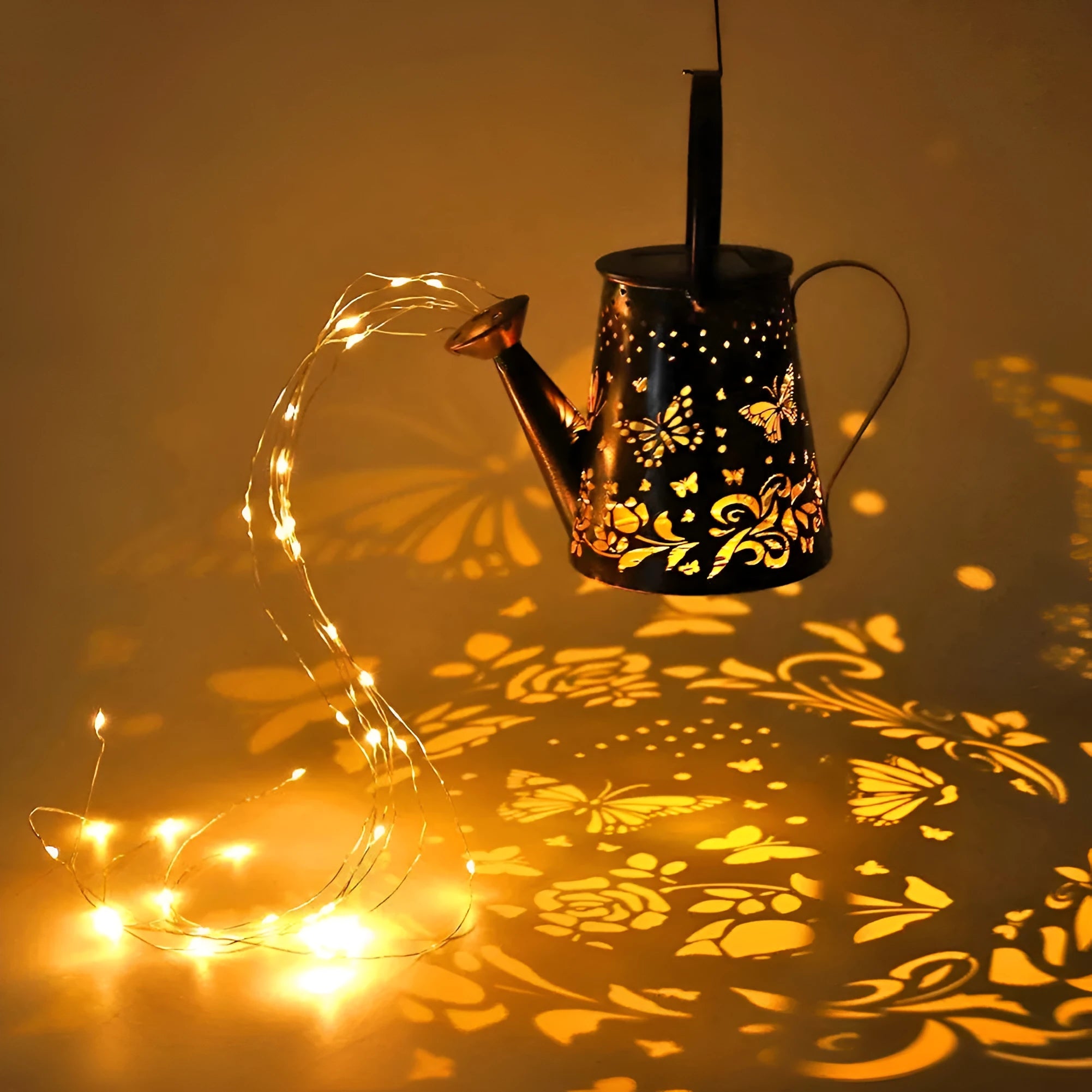 Iron solar garden lamp with tapered butterfly pattern and warm white LED lighting