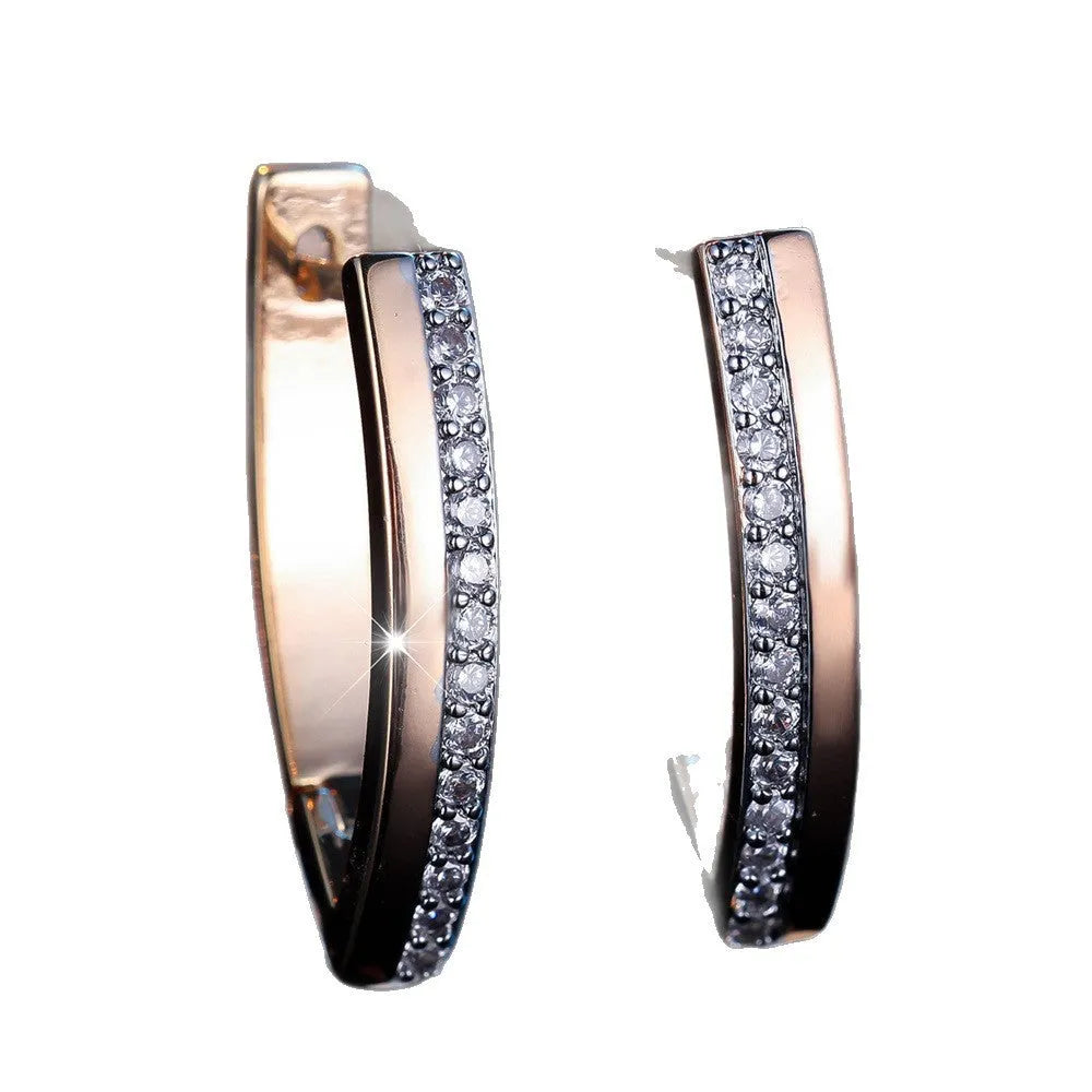 Geometric V-shaped women's clip-on earrings with champagne gold electroplating and white diamond accents