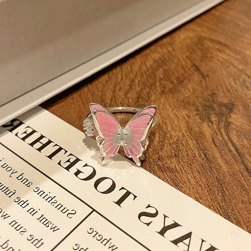 Women's copper butterfly ring with dripping oil finish and adjustable open loop design