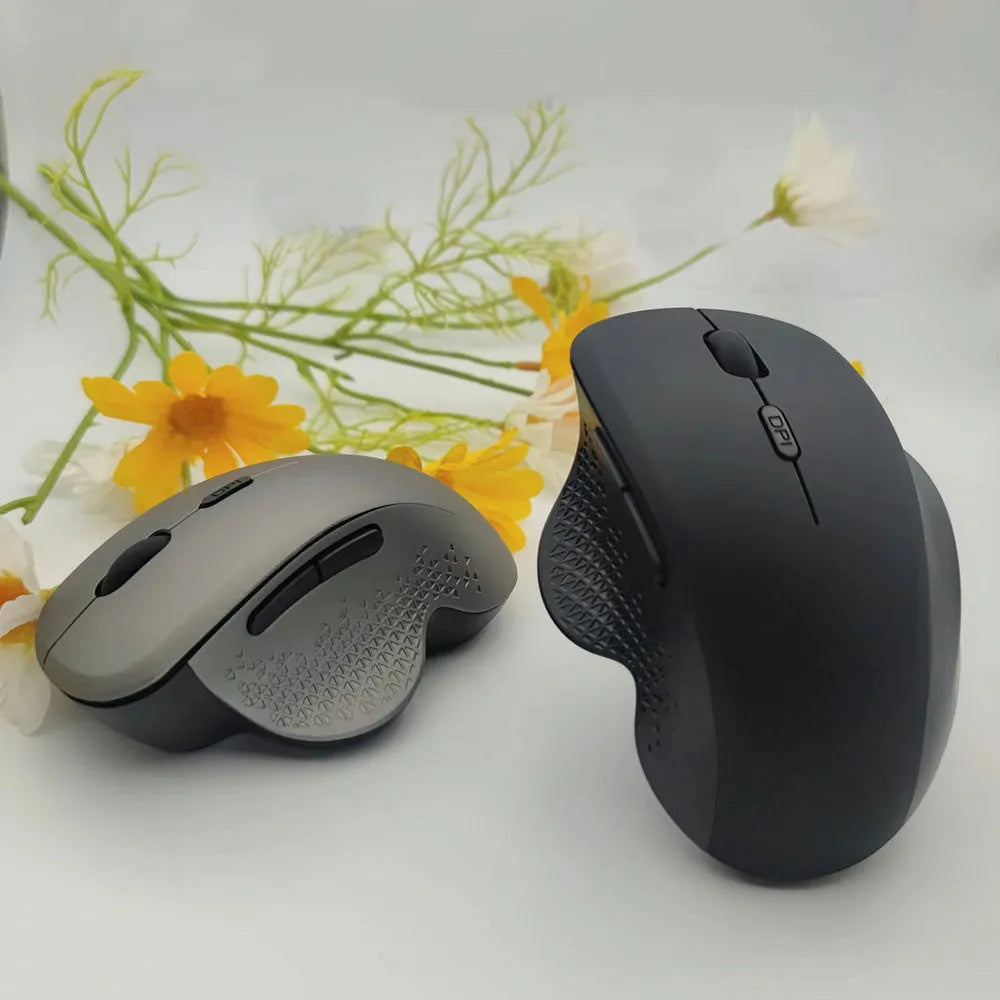 Grey or black self-charging wireless mouse with USB cable for laptop computers