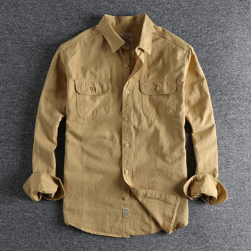 British retro style men's long sleeve cotton shirt in solid light blue colour with cardigan design