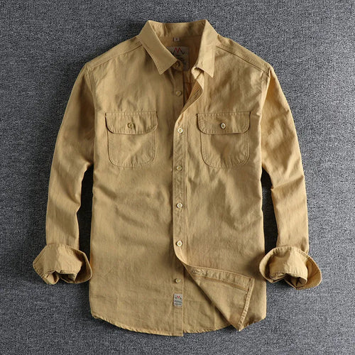 British retro style men's long sleeve cotton shirt in solid light blue colour with cardigan design