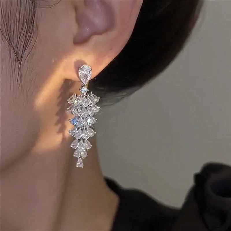 Silver pagoda Christmas tree drop earrings with sparkling zircon stones and stud fastening
